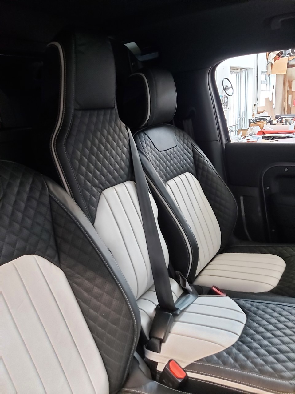 black and cream diamond stitched seats